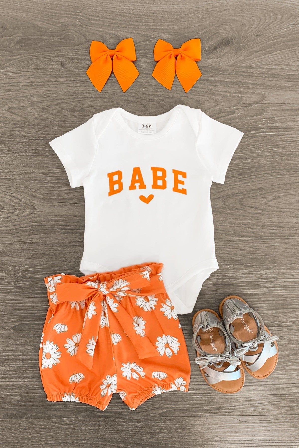 "Babe" Orange Daisy Onesie Set - Sparkle in Pink