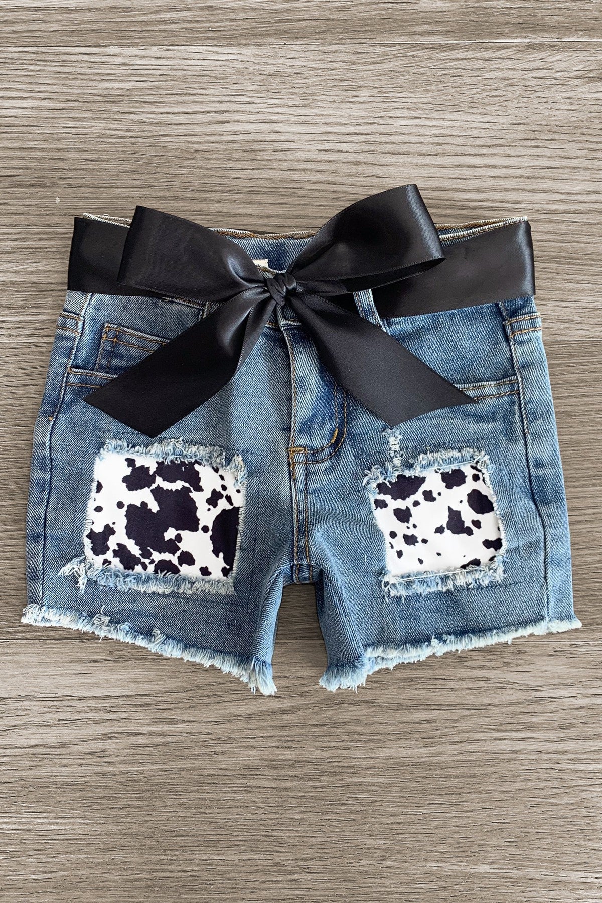 "Moody" Cow Print Denim Short Set - Sparkle in Pink